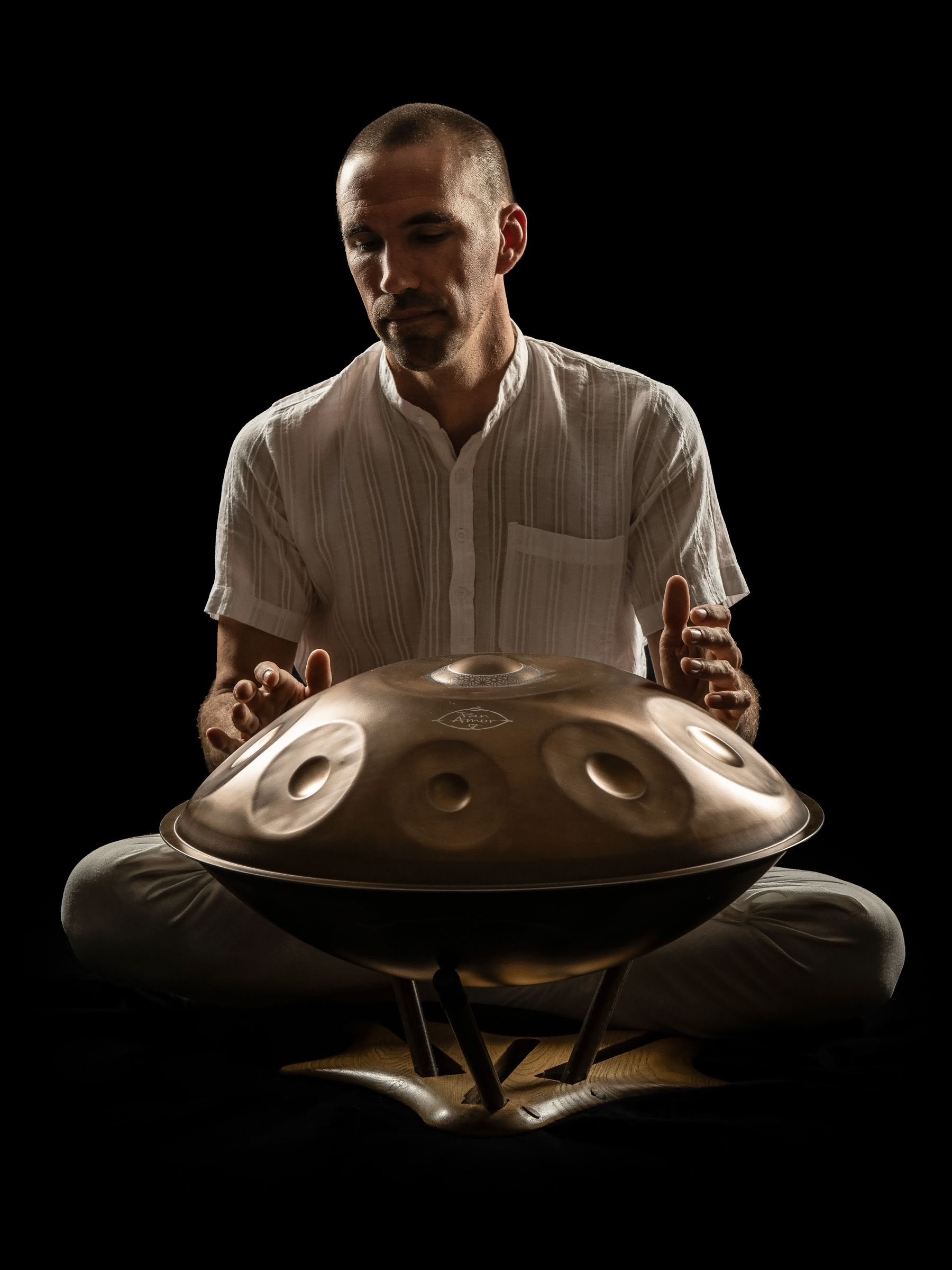 A sound journey - a group lying down among singing bowls and gongs